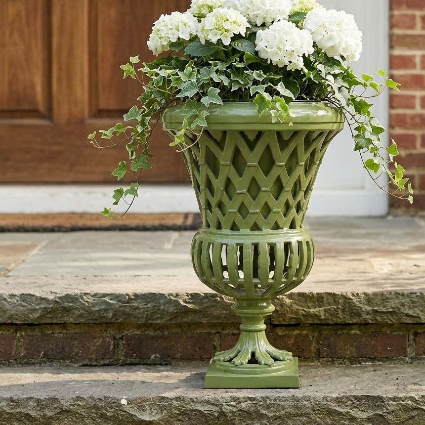 Lattice Garden Urn planted with ivy and white hydrangeas on a front doorstep