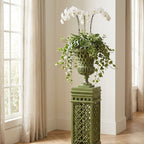 Lattice Garden Urn on matching pedestal in a bright living room