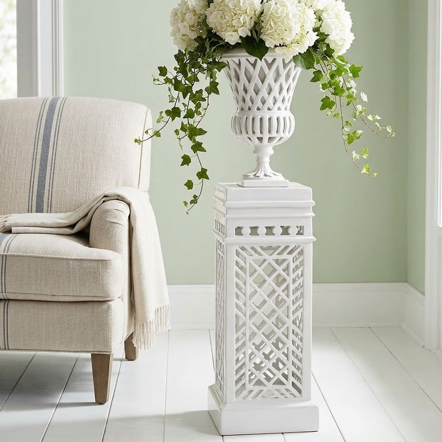 White Lattice Garden Urn on pedestal in a sunroom